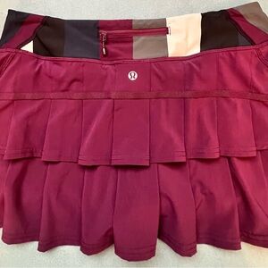 Lululemon vintage accordion style back skirt. 8. Purple with multi-color band